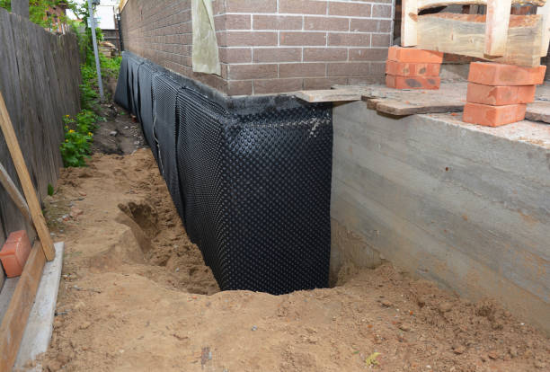 Happy homeowners after waterproofing job in Redkey